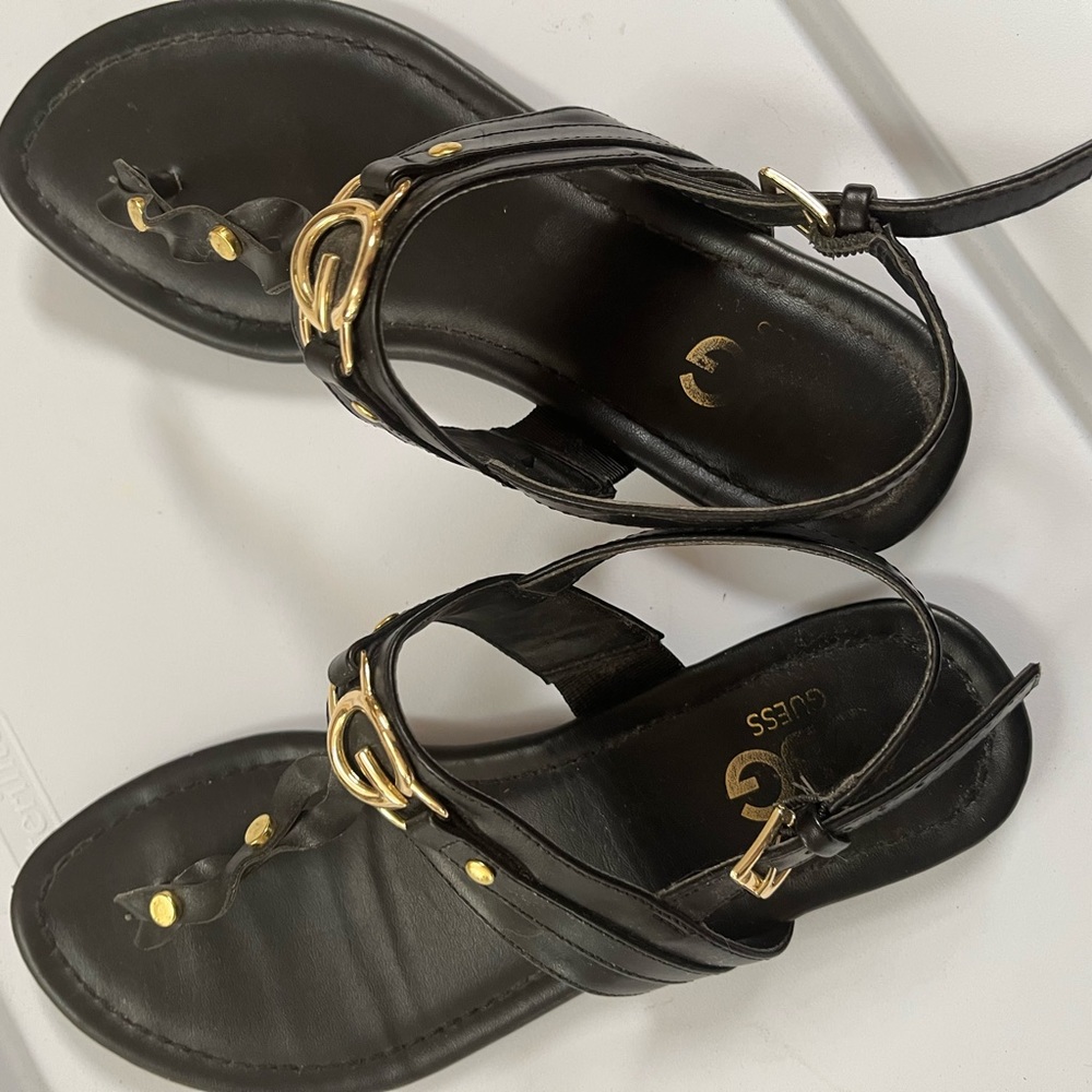 GUESS Sandals in black.